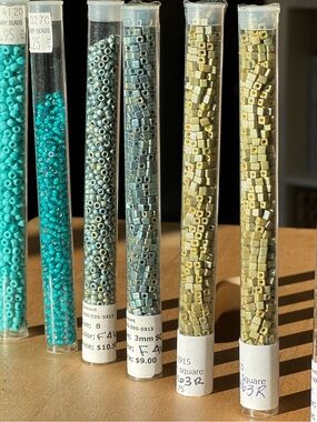 Assorted Glass Seed and Cube Beads in Teal and Olive and more.
